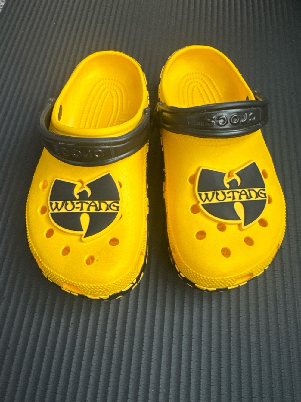 CROCS Kids Yellow Clog Sandals with Black Strap and Logo